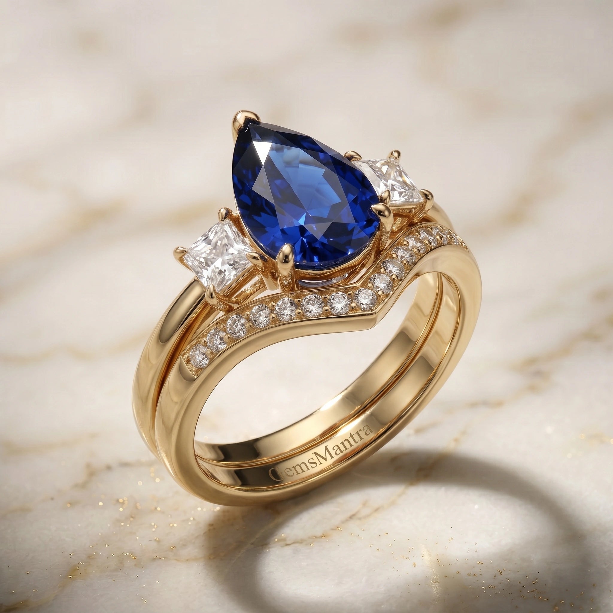 Pear Cut Royal Blue Sapphire Three Stone Chevron Bridal Set