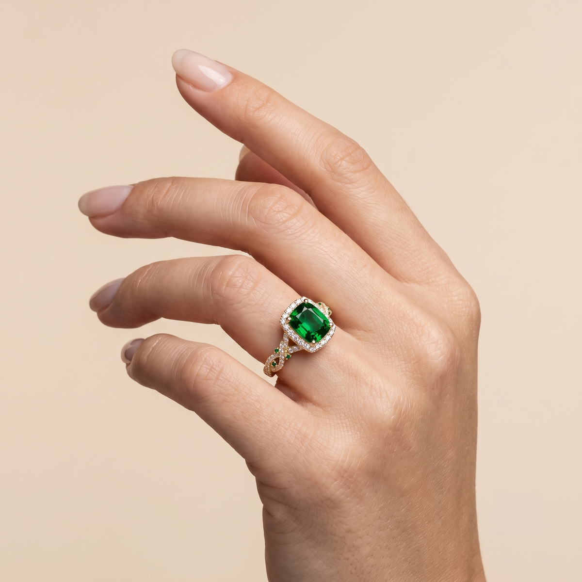 Regal Emerald Halo Ring in Gold Finish