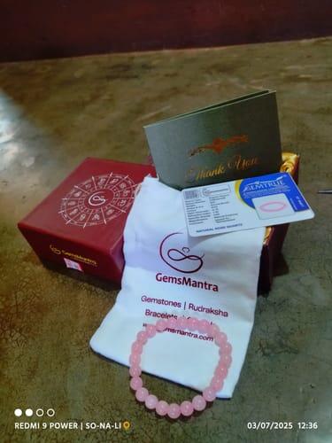 Customer photo of the GemsMantra box, pouch and report card