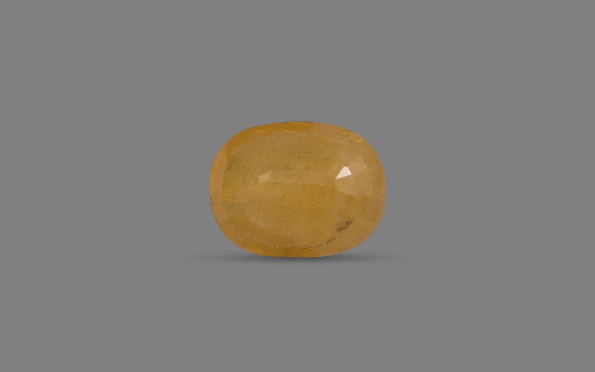 Yellow Sapphire (Pukhraj) – 5.94 Carat / 6.59 Ratti