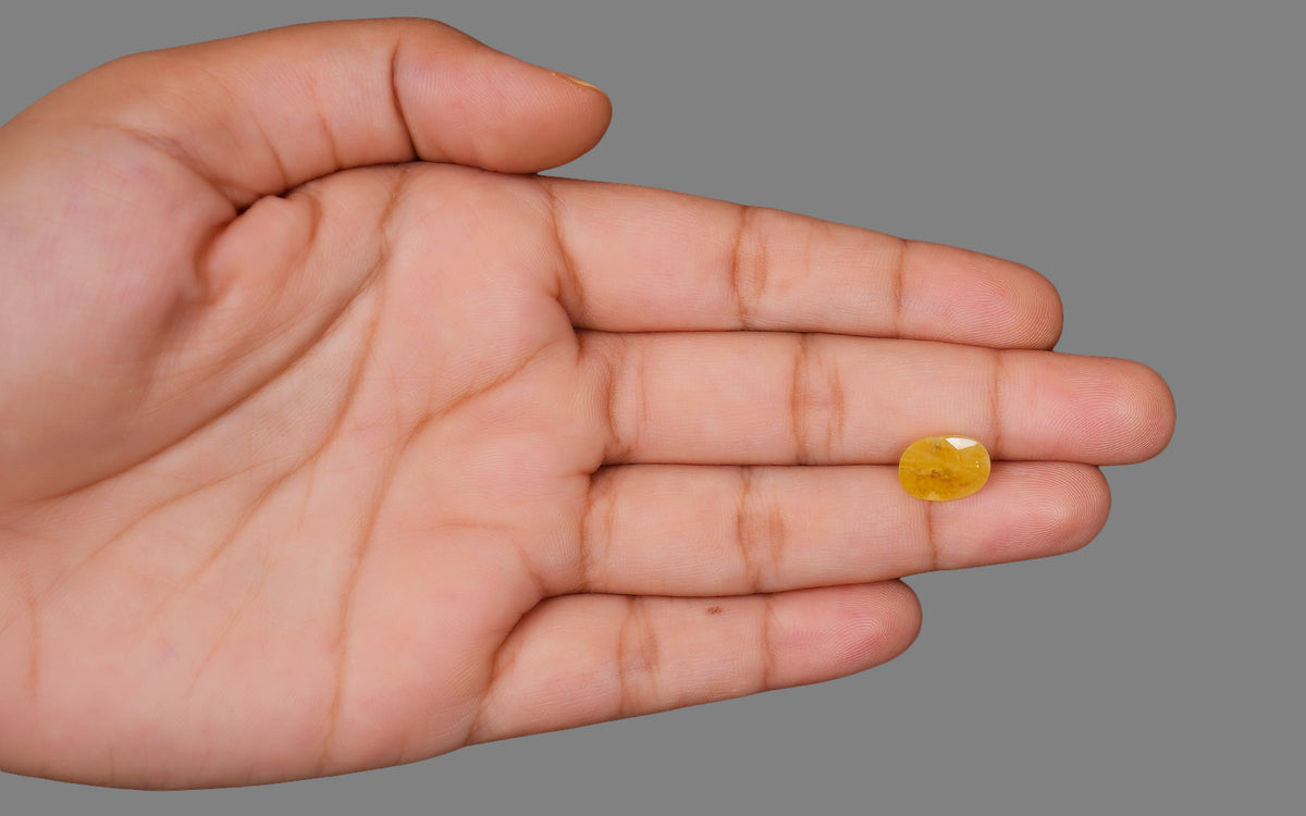 Yellow Sapphire (Pukhraj) – 5.94 Carat / 6.59 Ratti