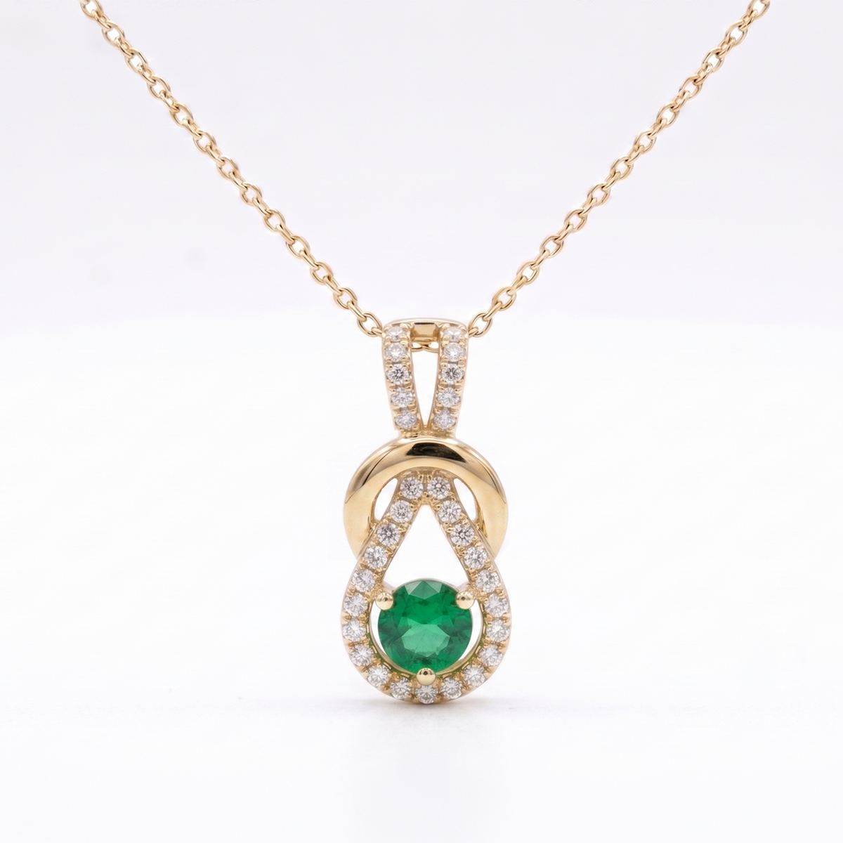 Emerald Infinity Twist Pendant
