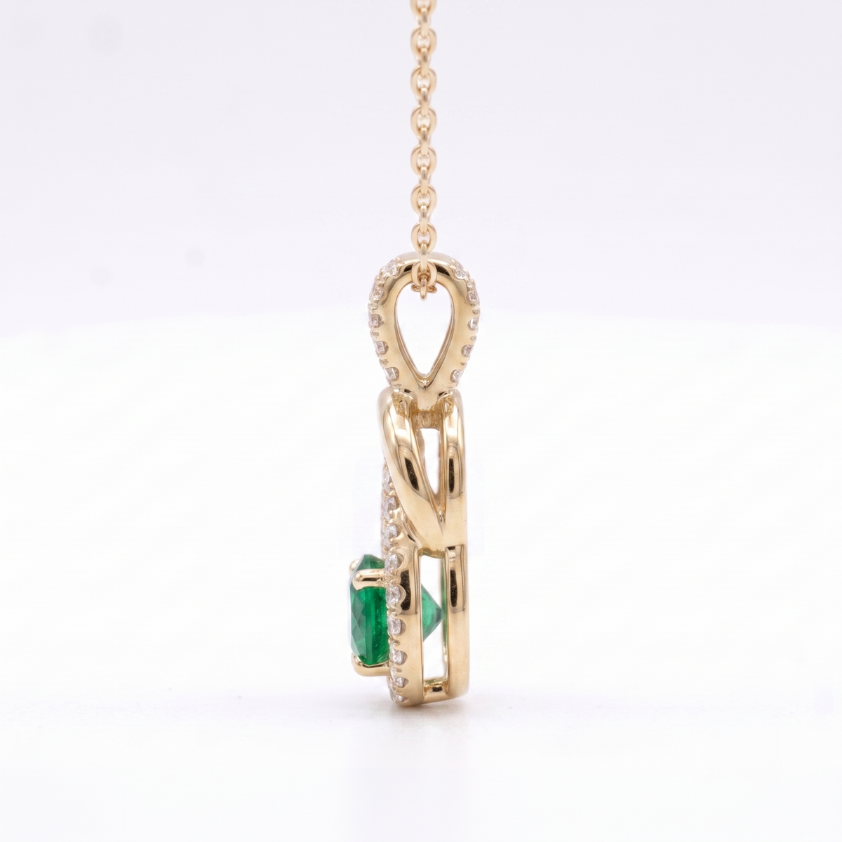 Emerald Infinity Twist Pendant