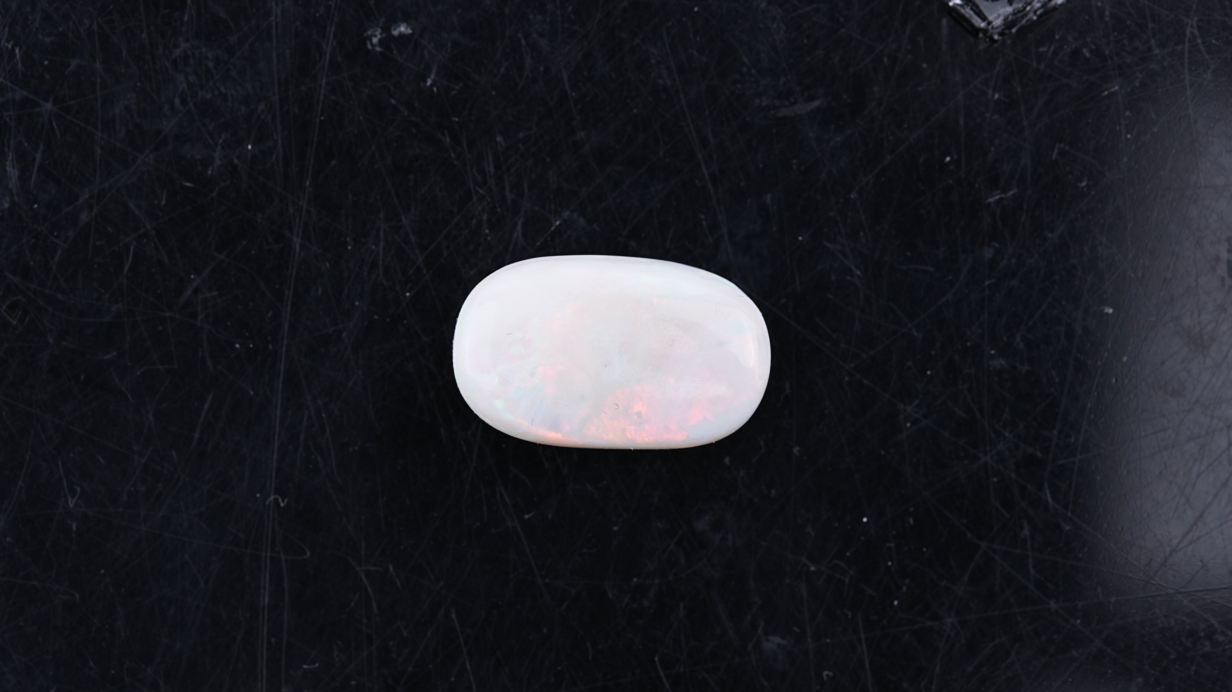 Opal with Fire - 9.87 Carats  (10.857 Ratti)