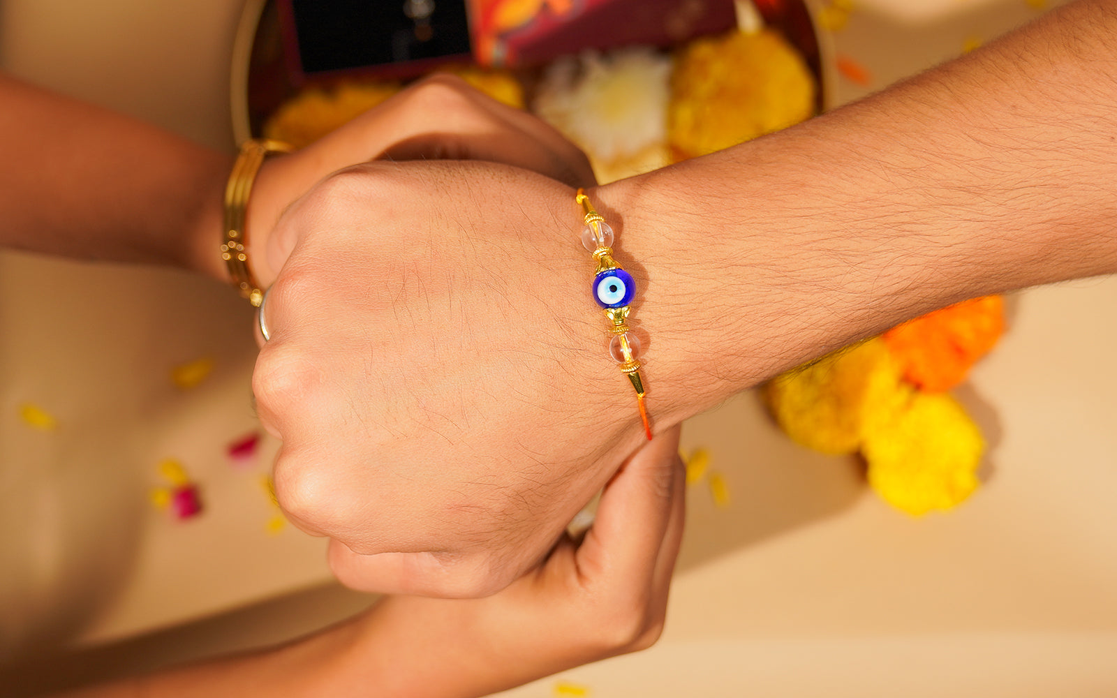 Evil Eye Rakhi – Protective Rakhi with Clear Quartz Beads