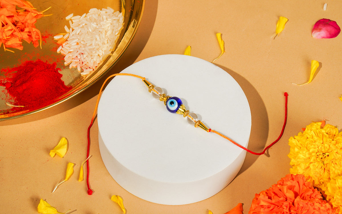 Evil Eye Rakhi - Protective Rakhi with Clear Quartz Beads
