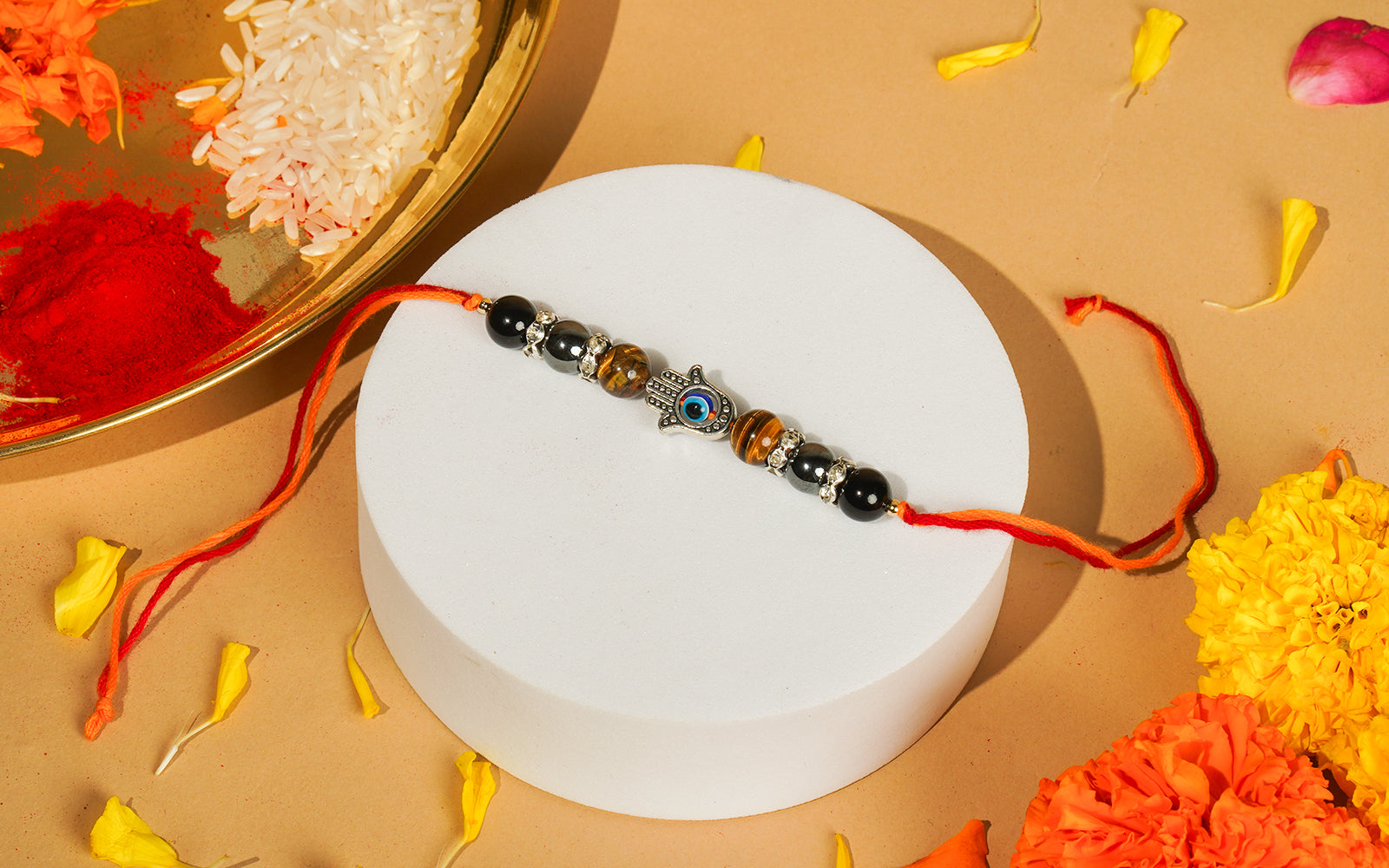 Protective Energy Rakhi – Hamsa Hand Rakhi with Tiger Eye Beads