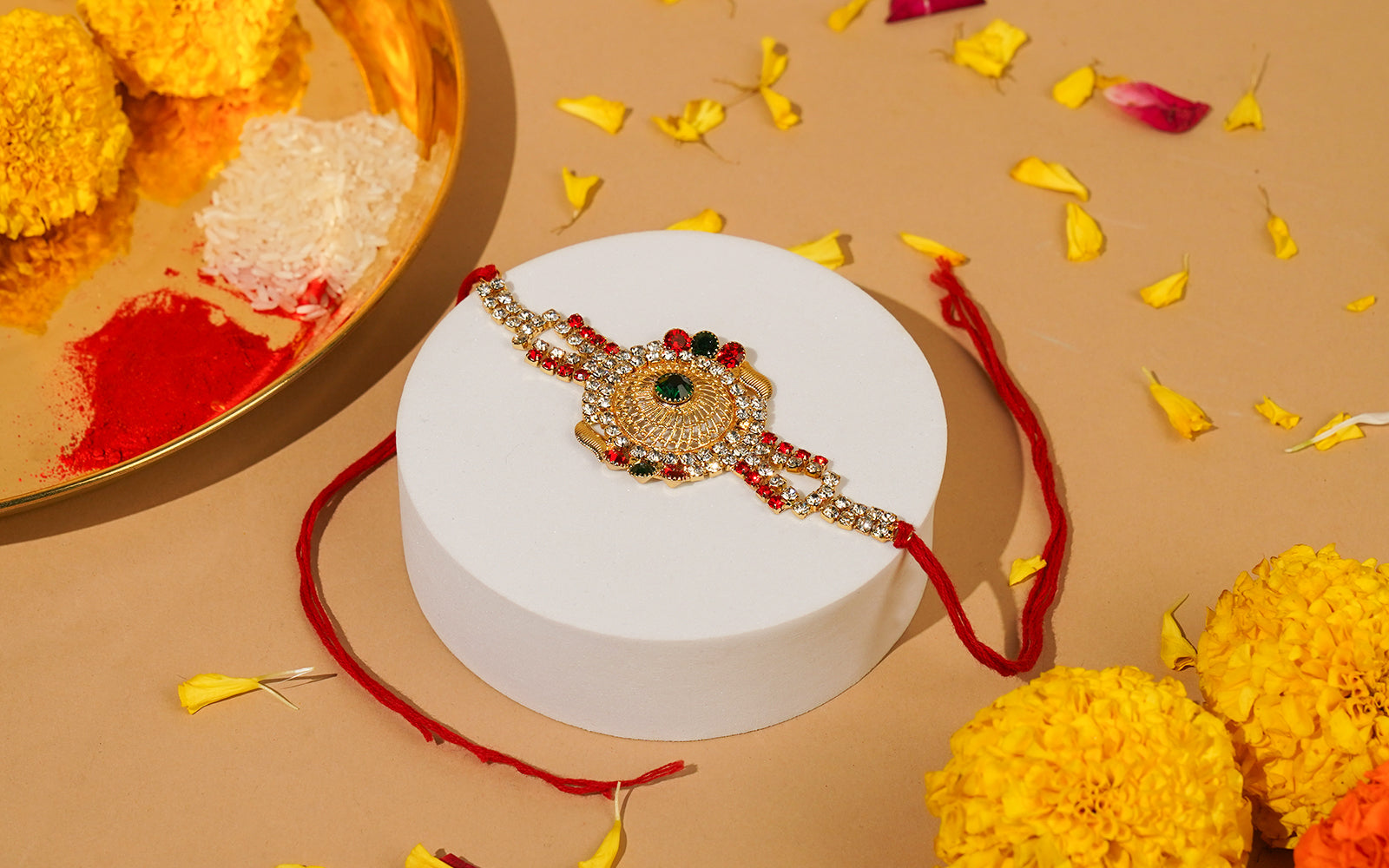 Divine Emerald Crown Rakhi