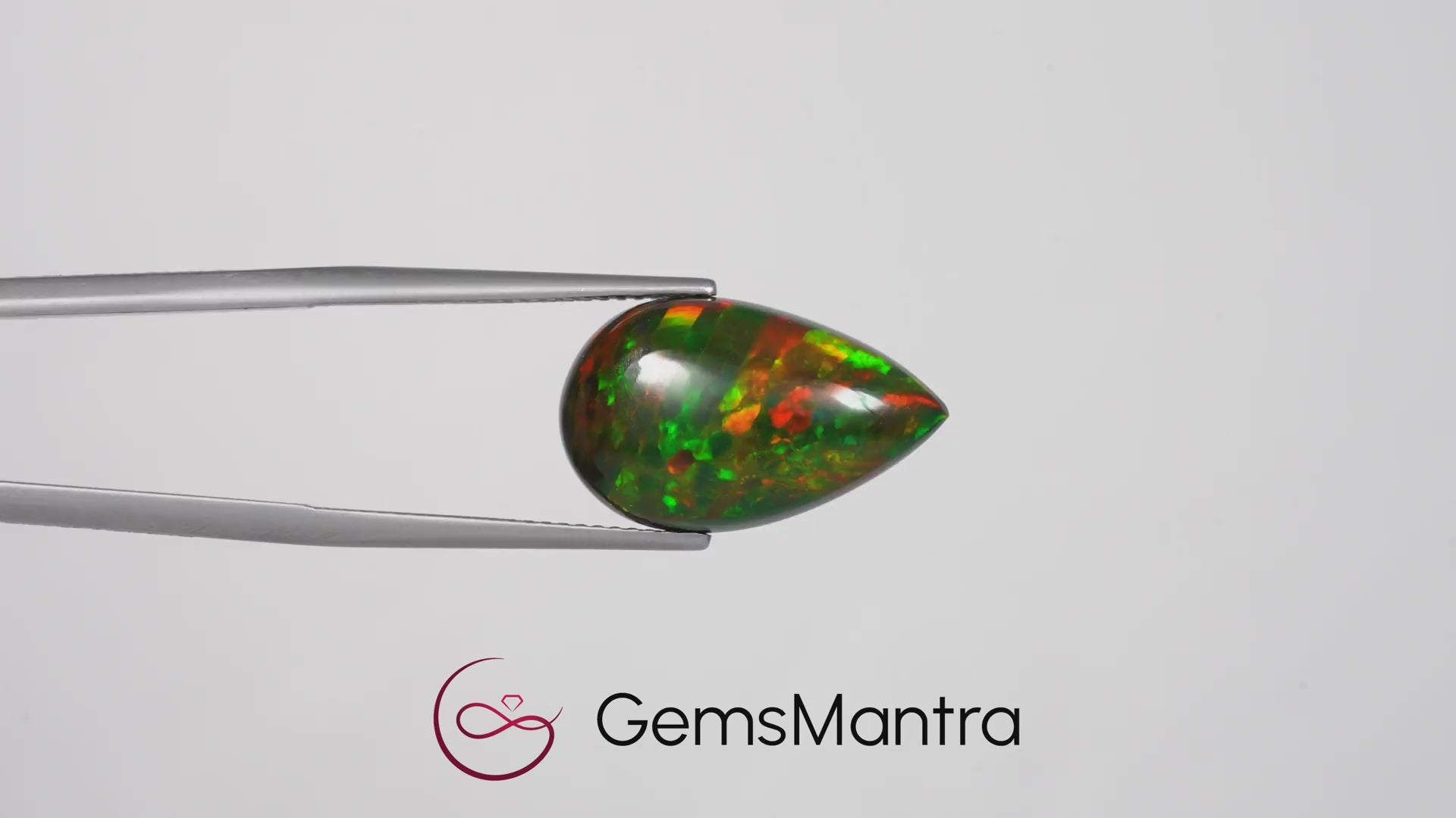 Black Opal (Treated) – 6.7 Carat / 7.4 Ratti [GM09486]
