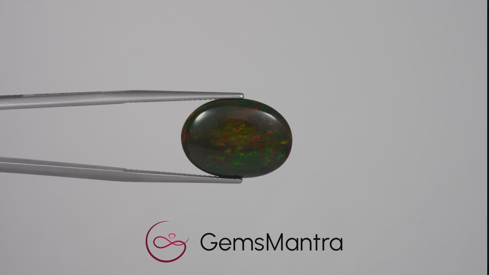 Black Opal (Treated) – 8.85 Carat / 9.7 Ratti [GM09490]